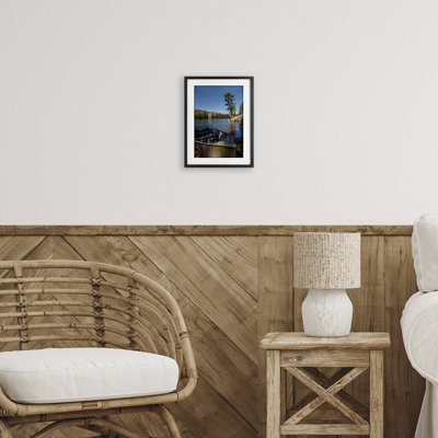 Bring It Back Docked Boat Framed Print Under Glass, design by Jon Evan