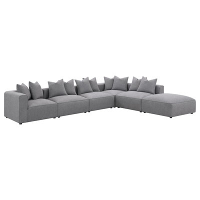 Canapé modulaire polyvalent avec plusieurs sièges, parfait pour créer des espaces de divertissement personnalisables et confortables.