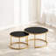 Ensemble de 2 tables basses gigognes rondes en similicuir noir foncé avec base dorée, peu encombrantes pour le salon