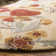 Emrick Blossom Hand Hooked Wool/Cotton/Latex Floral Rug in Beige