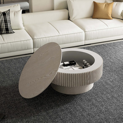 Table basse ronde moderne avec rangement caché et placage en bois massif