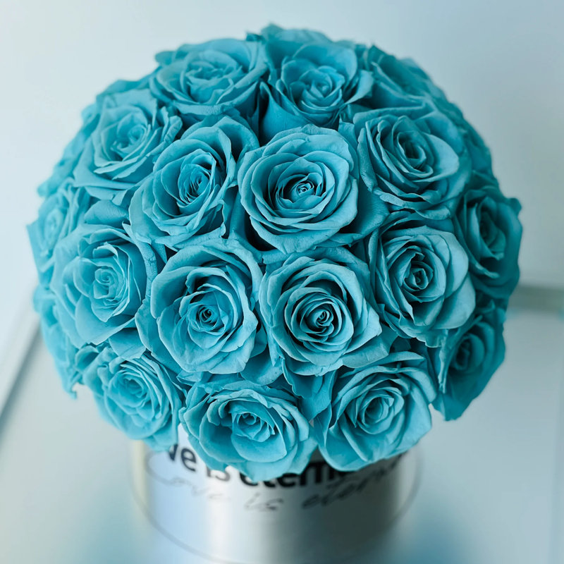 Arrangement de roses en boîte