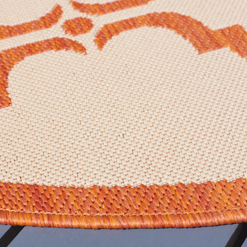 Tapis à motif géométrique intérieur/extérieur beige/rouge Herefordshire, Rond 5 pi