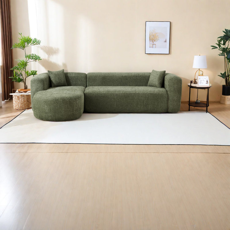 Canapé modulaire luxueux en chenille verte avec un design spacieux pour la maison