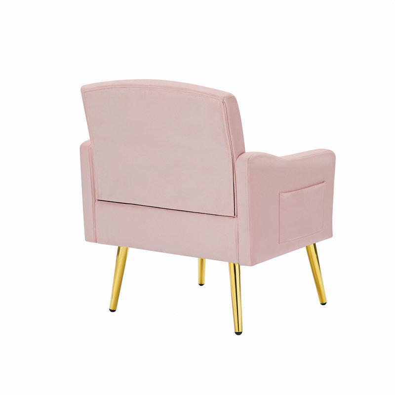 Fauteuil en velours avec pieds en métal