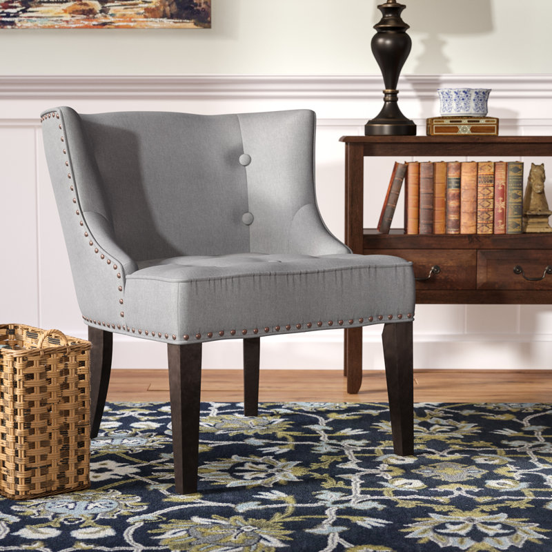 Fauteuil à oreilles capitonné Staas, 100% polyester gris