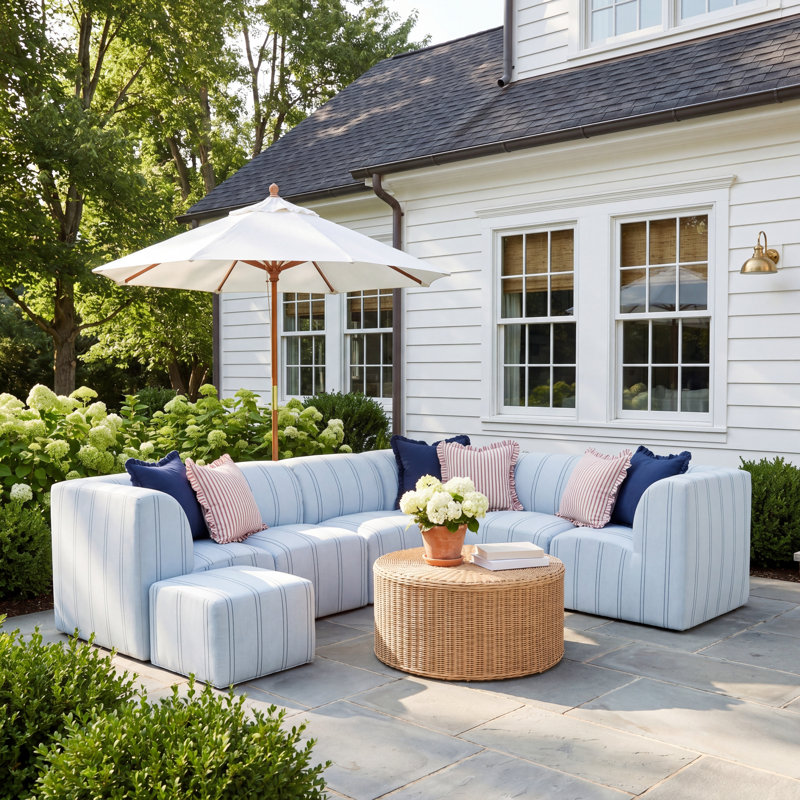 Eliana 7-Piece Upholstered L-shaped Sectional Sofa with Ottoman and Sunbrella Cushions, Wayward Sky