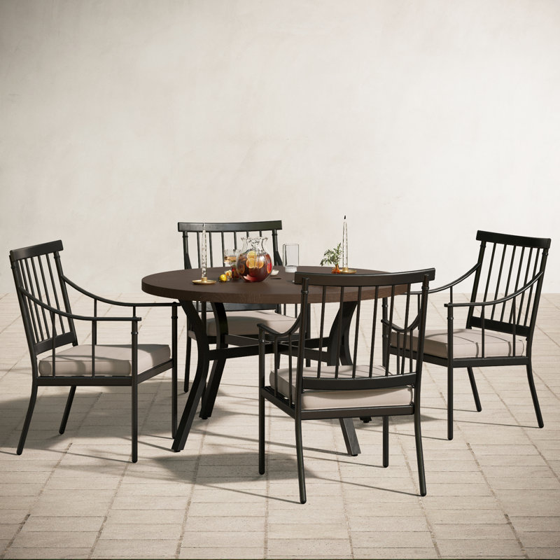 4 - Person Patio Dining Set with Round Table , Cushions Included