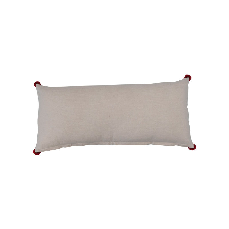 Coussin en coton avec broderies et pompons