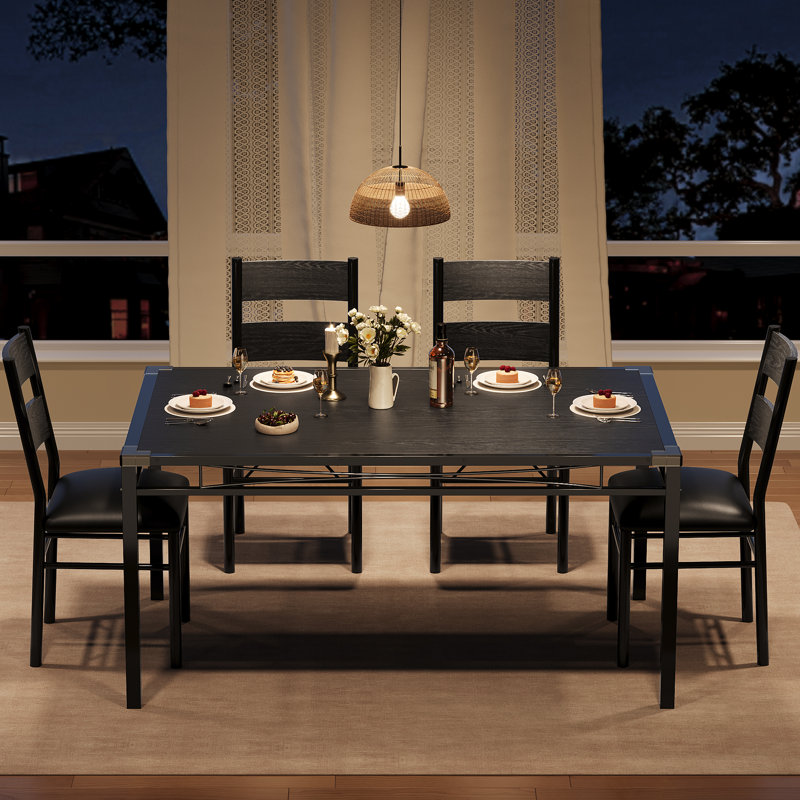 Ensemble de table et chaises de salle à manger moderne gain de place pour 4 personnes - Table en bois et en métal avec chaises rembourrées et protections d'angle - Noir classique - Idéal pour un appartement ou une petite salle à manger