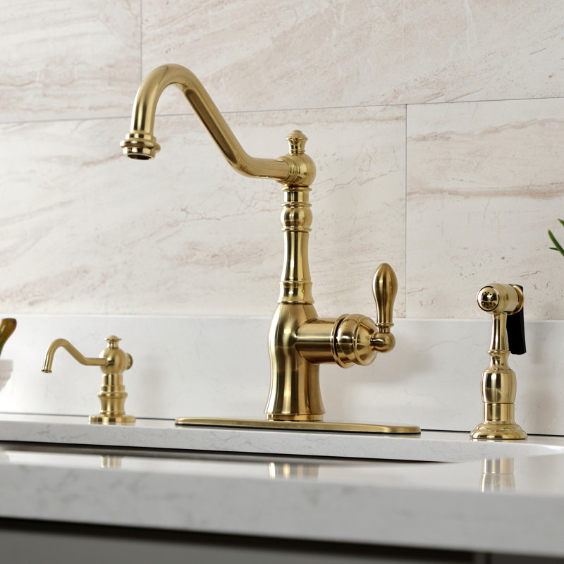 Kingston Brass American Classic Single-Handle 2-or-4 Hole Deck Mount Kitchen Faucet with Brass Sprayer, Brushed Brass