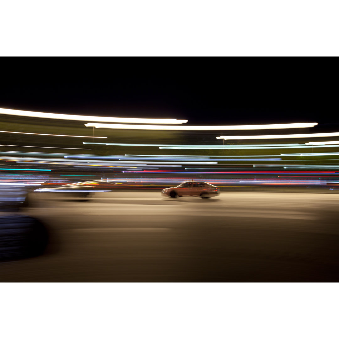 Blurred Shot Of Cars von TravelMotion - Leinwandbild