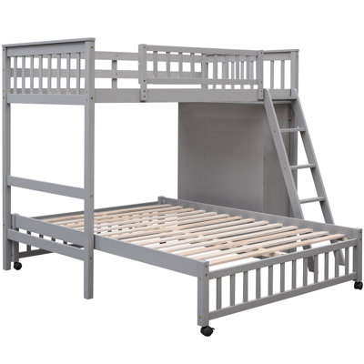 Lit superposé simple en bois au-dessus d'un lit double gris avec rangement à six tiroirs et options de tablettes flexibles, possibilité de montage