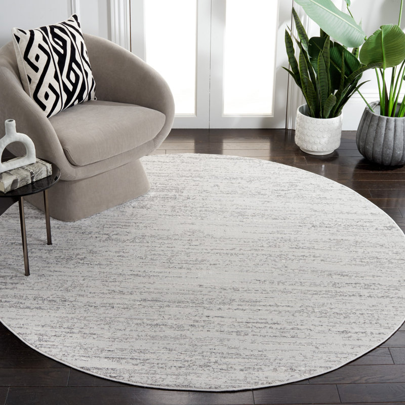 Tapis abstrait gris en polypropylène tissé à la machine Luyen, Rond 6 pi 7 po