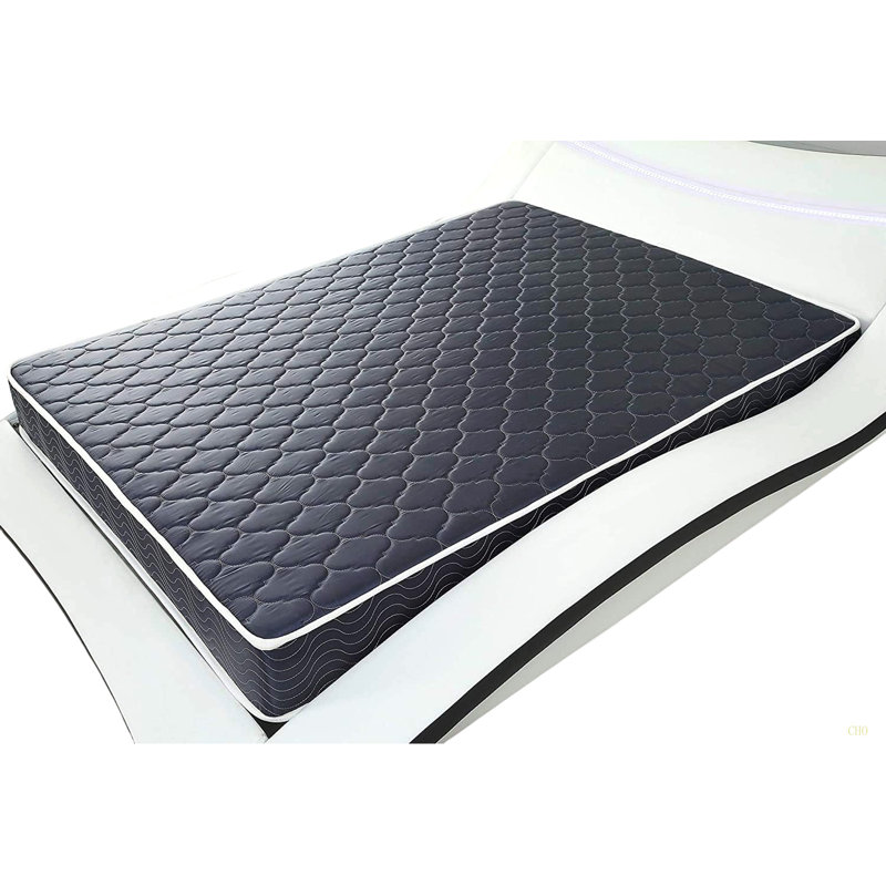 Matelas en mousse haute densité imperméable de 6 pouces avec tissu respirant matelassé bleu marine. La courtepointe assure à la fois style et circulation d'air pour un sommeil frais.