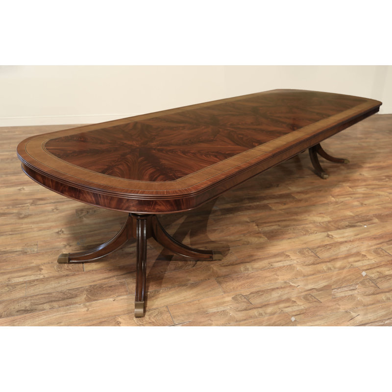 Table de salle à manger extensible à double piédestal avec bordure en bois satiné