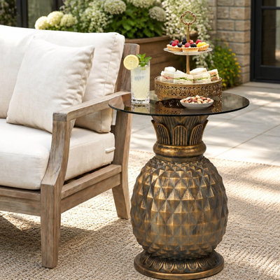 Table d'appoint ananas jaune de 60 cm de hauteur avec plateau en verre, idéale pour l'extérieur (terrasse, jardin) ou comme support pour plantes d'intérieur.