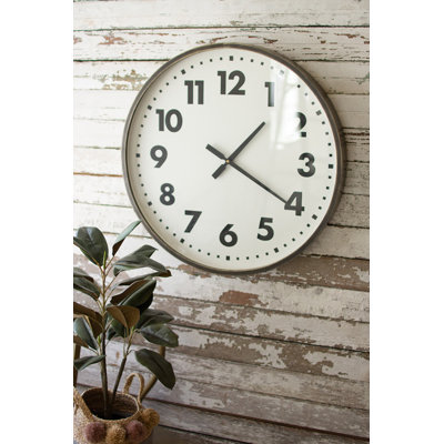 Horloge murale ronde noire et blanche