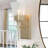 1-Light Dimmable Gold Wall Sconce with Seeded Glass Shade