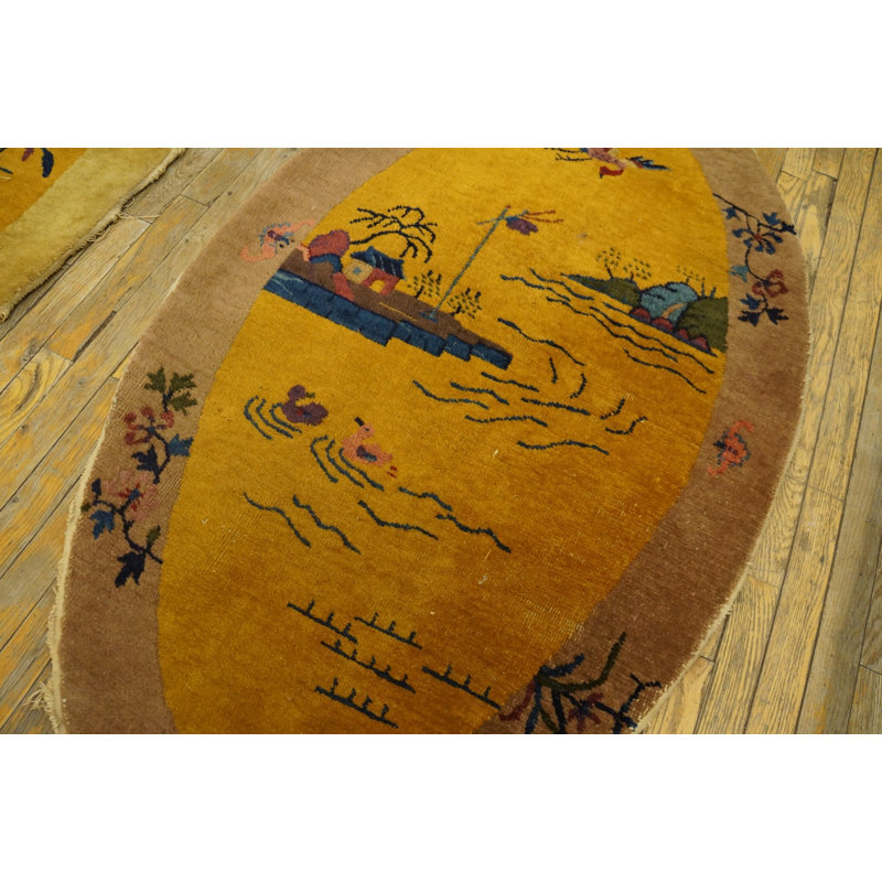 Paire de tapis ovales jaunes Art déco