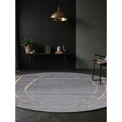 Tapis gris soyeux et moelleux