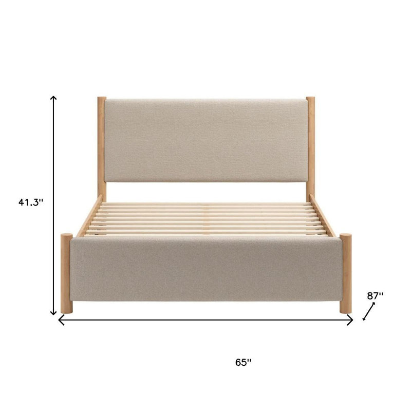 Structure de lit beige en bois et en tissu d'ameublement