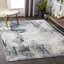 Cosey Abstract Navy/Gray Area Rug