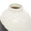 Vase tacheté avec bloc blanc