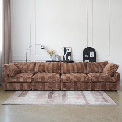 Canapé modulaire rembourré à accoudoirs larges