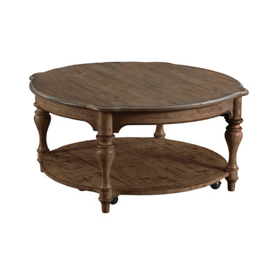 Abdas Solid Wood 4 Legs Coffee Table with Storage by Darby Home Co