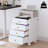 Modern 4-Drawer Dresser Cabinet with Glass Top Jewelry Display, Rolling Storage Unit with Lockable Casters for Bedroom or Living Room-1480863911