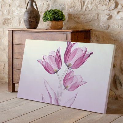 Toile, un arrangement délicat de trois tulipes roses douces avec des pétales translucides, tendus doucement l'un vers l'autre, reproduction d'art sur toile