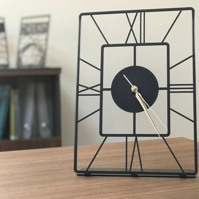 Horloge murale noire élégante 7,9 po x 11,8 po | Fabrication 100% métal (épaisseur: 0,08 pouce) | Facile à suspendre, nécessite 1 pile AA (non incluse) | Décoration moderne pour le salon et le bureau