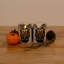 Bougies en verre DEL à piles avec flamme vacillante et crâne en sucre - 2 pièces