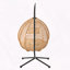 Chaise hamac en rotin tissé et rembourré