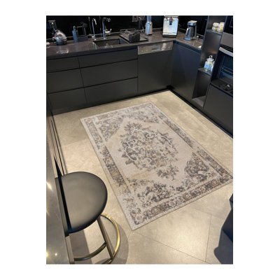 Tapis tissé lavable à motif floral traditionnel