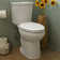 Toilette à devant double chasse American Standard H2Option
