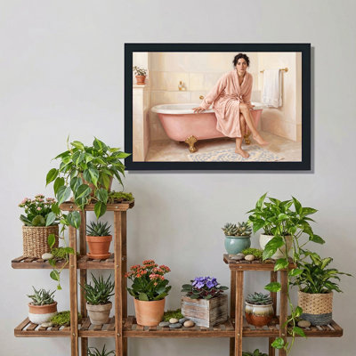 Art sur toile, femme en peignoir rose assis sur une baignoire sur pattes rose