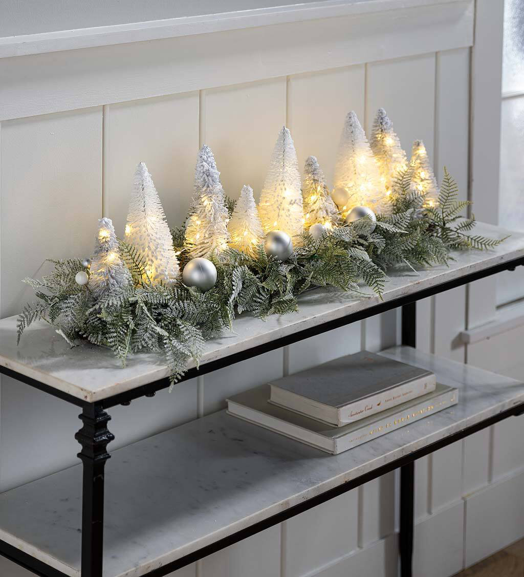 https://assets.wfcdn.com/im/47034553/compr-r85/2268/226828065/lighted-holiday-centerpiece-with-bottle-brush-trees.jpg