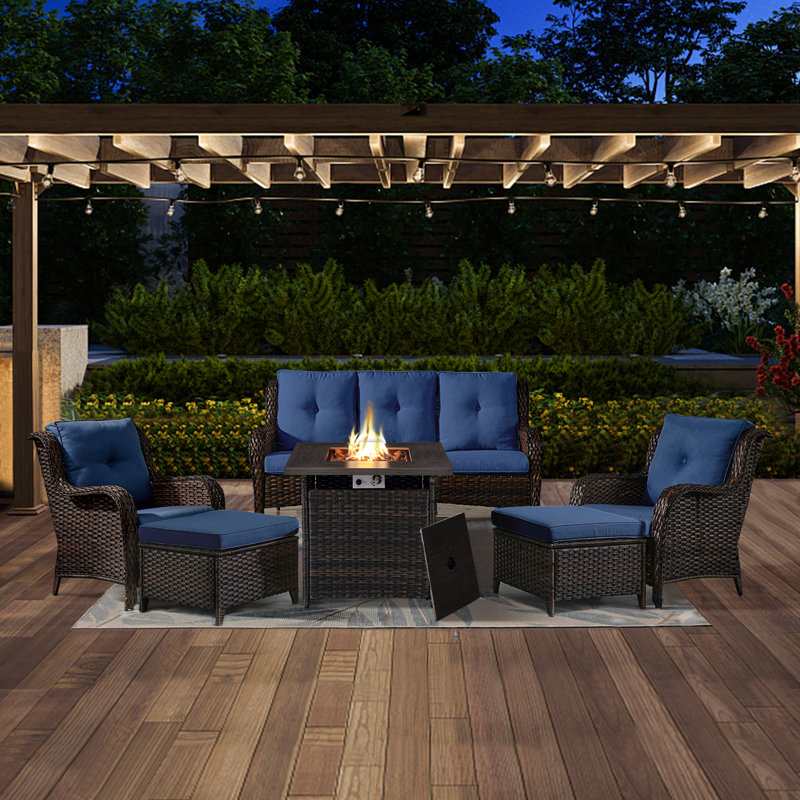Schutt 5 - Person Wicker Outdoor Seating Group with Fire pit, Sofa, Chairs, Ottomans and Cushions, Blue, Brown