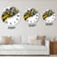 Horloge murale moderne en marbre jaune et gris sur fond blanc-654607605