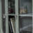 Vaillancourt Glass Paned Distressed Accent Cabinet 