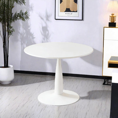 Table de salle à manger ronde avec base en métal Tulip