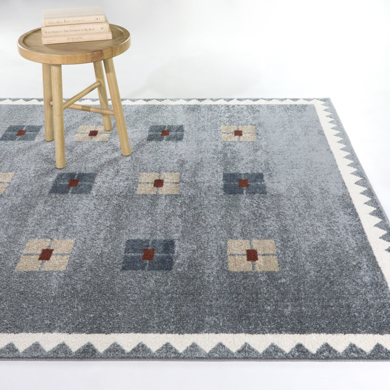 Tapis à motif géométrique bleu / beige Achron, 7 pi 10 po x 10 pi