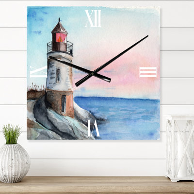 Un phare sur un rivage en début de matinée - horloge murale nautique et côtière