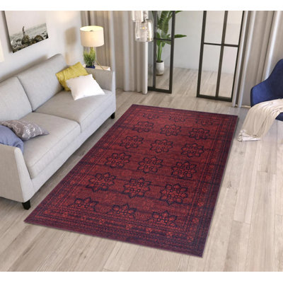 Tapis afghan rouge à motif tissé rétro