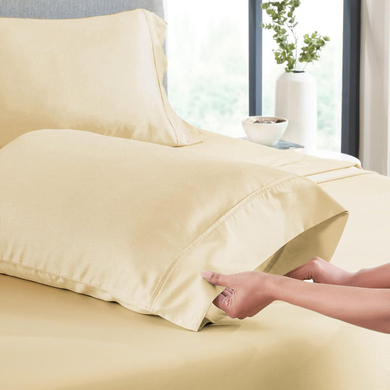 Ensemble de draps en microfibre / polyester à densité de tissage 180 fils Argia, Ivoire