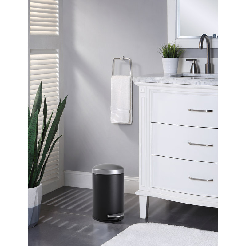 Compact Black and Silver Steel Step Trash Can with Slow Close Lid