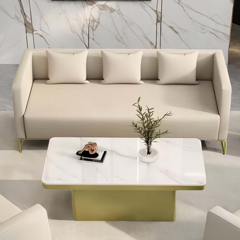 Beige sofa and coffee table reception set