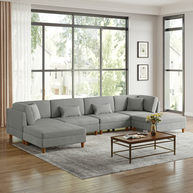 Canapé modulaire en velours côtelé gris clair avec dossier coussiné et repose-pieds amovible Seemab, Gris clair